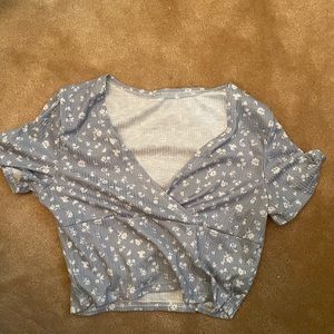Blue overlapped v neck crop-top with white flowers